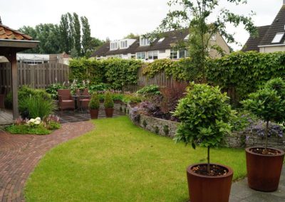 tuinontwerp romantische tuin met buitenkamer